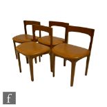 Nathan Furniture - A set of four teak rail back dining chairs, with brown vinyl upholstered seats