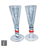 Siddy Langley - A pair of drinking glasses, each with clear funnel bowl above a swollen stem with