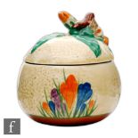 Clarice Cliff - Crocus - An Apple shaped preserve pot and cover circa 1930 hand painted with