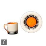 Susie Cooper - A small Tango coffee can and saucer, hand painted with graduated black bands and an