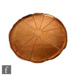 W.A.S Benson - An early 20th Century Arts and Crafts copper charger or table tray top formed as a