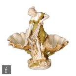 Royal Dux - An early 20th Century Art Nouveau table centre modelled as a maiden perched on a