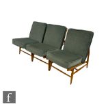 Lucian Ercolani for Ercol Furniture - A set of three beech framed model 427 easy chairs, bearing