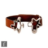 Henning Kopel - Georg Jensen - A post war Danish bracelet, the leather strap with a silver '