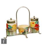 Clarice Cliff - Delecia Citrus A three-piece cruet set circa 1932 hand painted with fruit over a