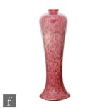 Ruskin Pottery - A Mei Ping vase decorated in an all over Strawberry Crush lustre glaze, impressed