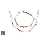 Unknown - A post war Modernist 835 silver necklace and bracelet formed as shaped bars with large