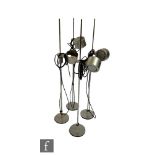 In the manner of Joe Colombo for Oluce - A set of four Serie Coupe style aluminium floor lamps, each