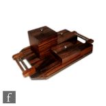 Unknown - A mid 20th Century Indian rosewood four piece dressing table set, the canted tray with