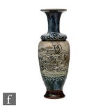 Hannah Barlow - Royal Doulton - An early 20th Century footed baluster vase with flared neck, the