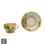 Clarice Cliff - Capri - A Lynton cup and saucer circa 1935 hand painted with stylised yellow and