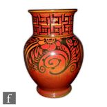 William Salter Mycock - Pilkingtons Royal Lancastrian - A shape 3043 ruby lustre vase of footed