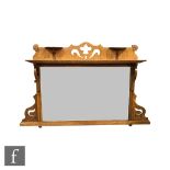Unknown - An Arts and Crafts oak framed over-mantel mirror, with fret-cut detail to the frame and