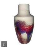 Ruskin Pottery - A large high fired vase of shouldered form decorated with a mottled purple and deep