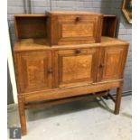 Attributed to Paul Matt for Brynmawr Furniture Makers - An oak cabinet bookcase or sideboard with