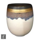 Hazel Johnston - A contemporary studio pottery vase of footed flared form, decorated with a dribbled