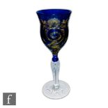 Stevens & Williams - An early 20th Century double colour cased wine glass, having a slender ogee