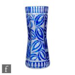 W Schreiber - A 1920s glass vase of waisted sleeve form, cased in blue over clear crystal and acid