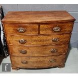 A 19th Century mahogany bowfront chest of drawers, oval brass drop handles, on ogee bracket feet,