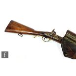 A 19th Century percussion musket with ram rod, Tower mark and crown, barrel 67.5cm, brass trigger