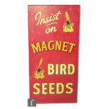 A 1960s pictorial advertising sign for Magnet bird seeds with adverts of Walsh's products,