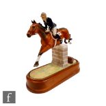 A Royal Worcester equestrian figure of Stroller and Marion Coakes, modelled by Doris Lindner,