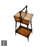 A Victorian walnut sewing table on splayed legs united by an under tier, 69cm x 30cm.