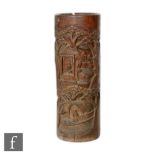 A 19th/20th Century Chinese bamboo brushpot Bitong, the slender vessel, carved in relief with manchu