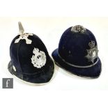 An early 20th Century six blue cloth panel policeman's helmet, later Birmingham City badge by