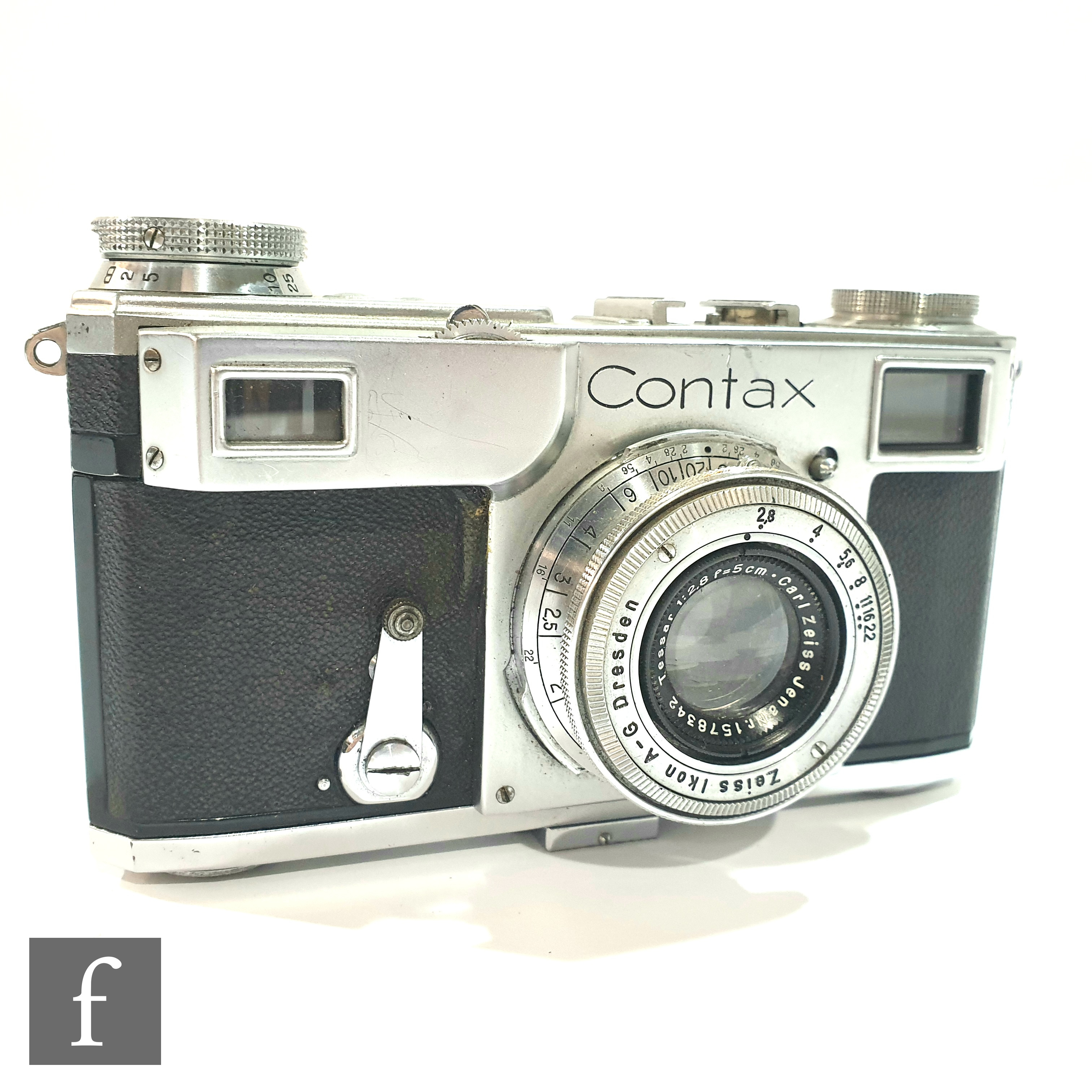A Zeiss Ikon Contax II 35mm rangefinder camera, serial number B31005, together with a Carl Zeiss 1:
