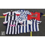 A West Bromwich Albion blue and white football shirt, logo T-Mobile, a similar shirt, logo West