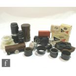 A collection of Leica Ernst Leitz Wetzlar lenses and accessories, to include a Hektor f= 13.5 cm 1: