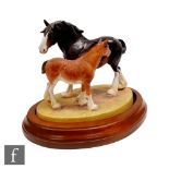A Clermont Fine China model of a Shire Mare and Foal Decoy Princess Anne Decoy Royal Surprise,