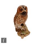 A Boehm porcelain model of a Tawny Owl, numbered 41, year 1989, printed mark, height 27cm.