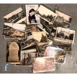 A large collection of Edwardian postcards to include real photographic street scenes, rural views,