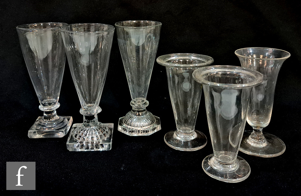 A group of 18th Century and later glasses to include three ale glasses with various adaptations of a