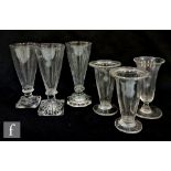 A group of 18th Century and later glasses to include three ale glasses with various adaptations of a