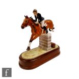 A Royal Worcester equestrian figure of Stroller and Marion Coakes, modelled by Doris Lindner,