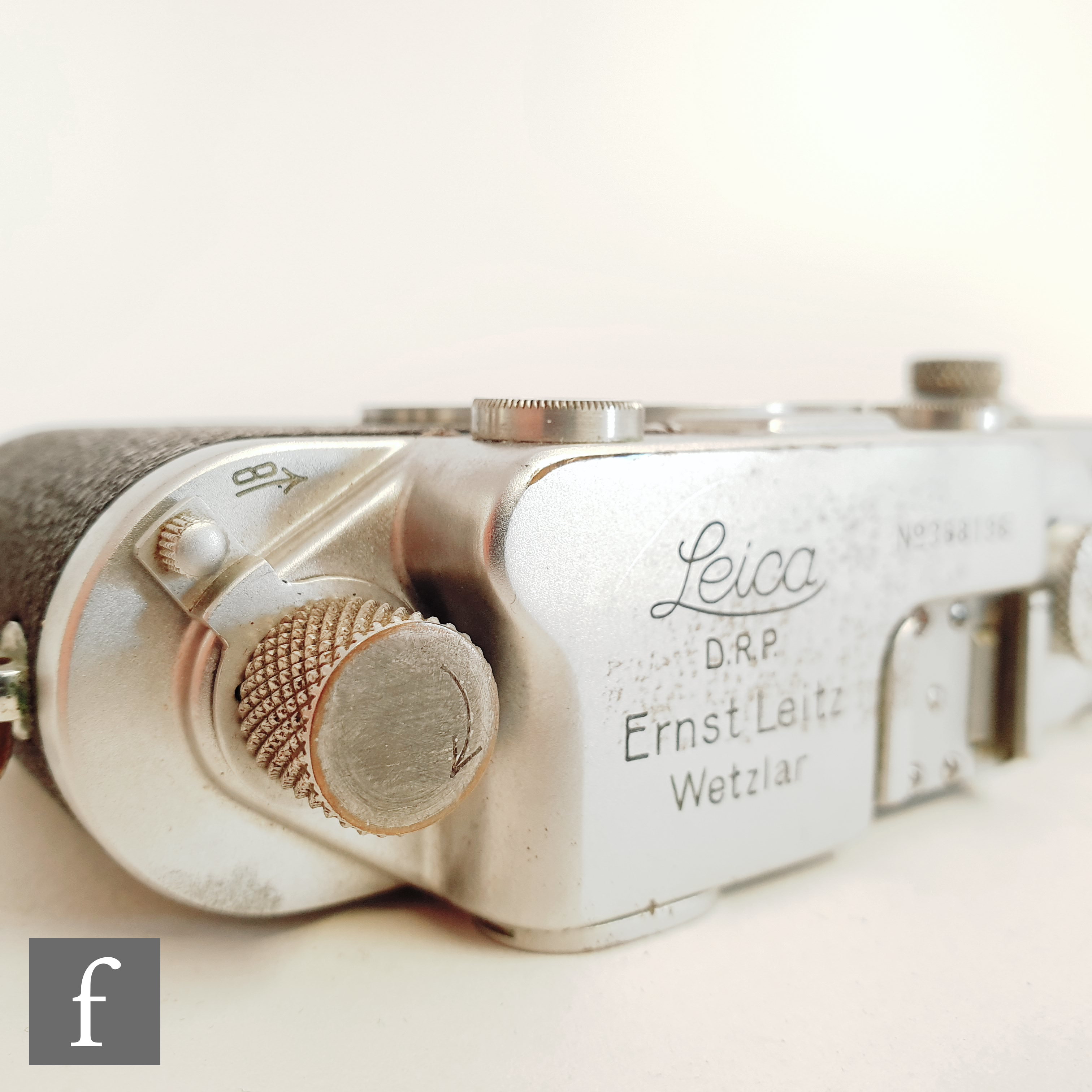 A Leica IIIC rangefinder camera, circa 1941, serial number 368196, Chrome body, with Ernst Leitz - Image 4 of 11