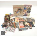 A collection of Elvis Presley related items to include Presleyana V Price Guide, Windmill records