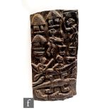 An African tribal rectangular carved wooden panel depicting a village scene with figure on a canoe
