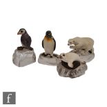 Four miniature Albany China models of animals and birds with metal mounts and affixed to clear glass