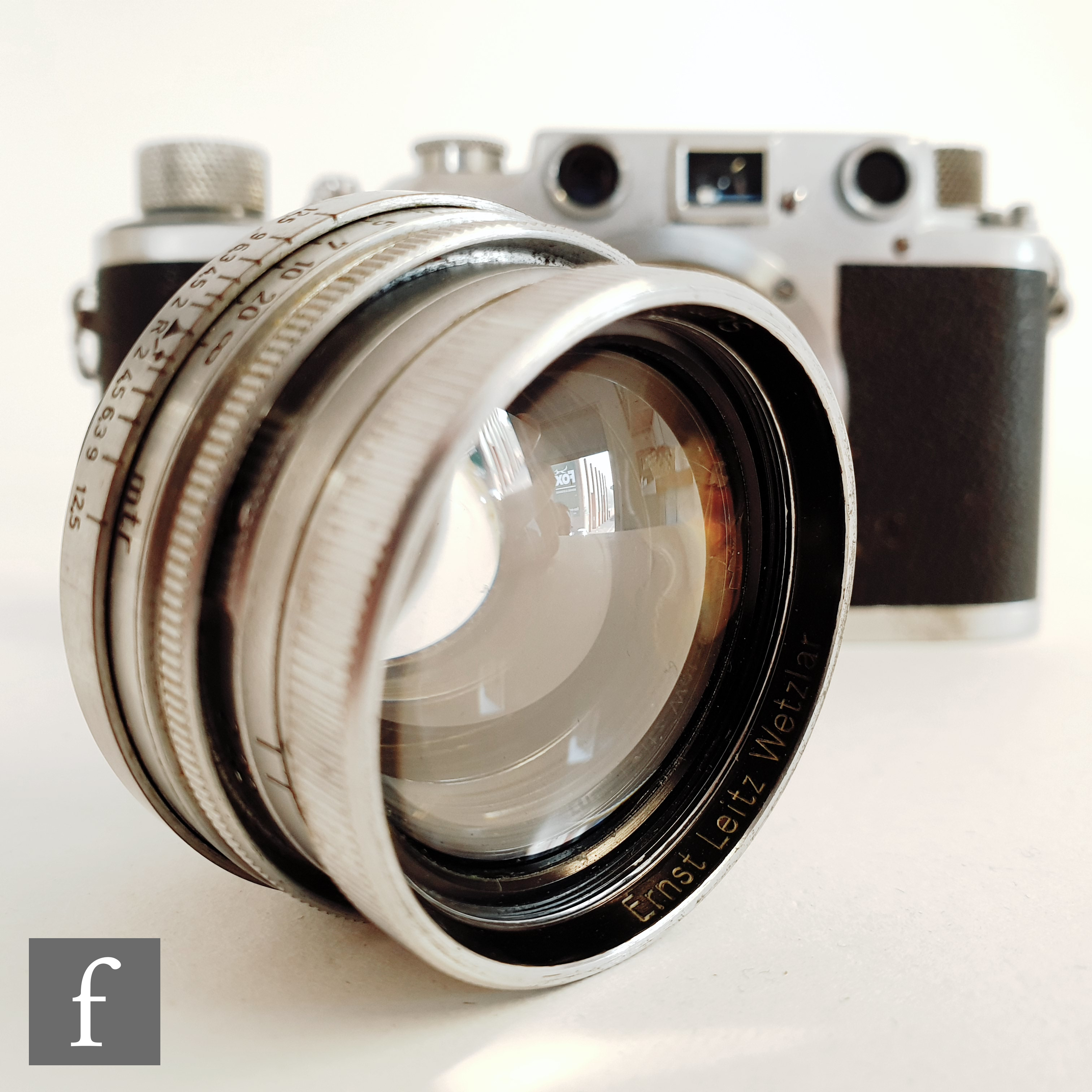 A Leica IIIC rangefinder camera, circa 1941, serial number 368196, Chrome body, with Ernst Leitz - Image 8 of 11