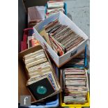 A large collection of 7 inch singles, dating from the 1960s, 70s, 80s and 90s, various genres and