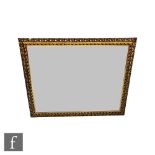 A large 20th Century gilt Florentine style beveled edge wall mirror, 99cm x 118cm.