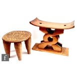 Two African tribal carved wooden stools, a rectangular Ashanti style example, length 49cm, height