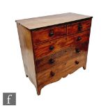 A Victorian mahogany and line edged straight front chest of two short and three long drawers, turned