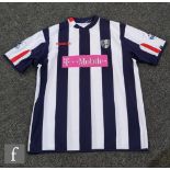 A Johnathan Greening match worn West Bromwich Albion football shirt No 8 in blue and white, logo T