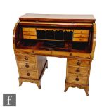 A 19th Century mahogany cylinder twin pedestal writing desk, fitted with a drawer and pigeon hole