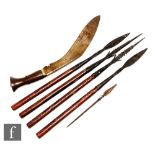 Four South American short hunting or throwing spears, a fish spear and a Kukri, A/F. (6)